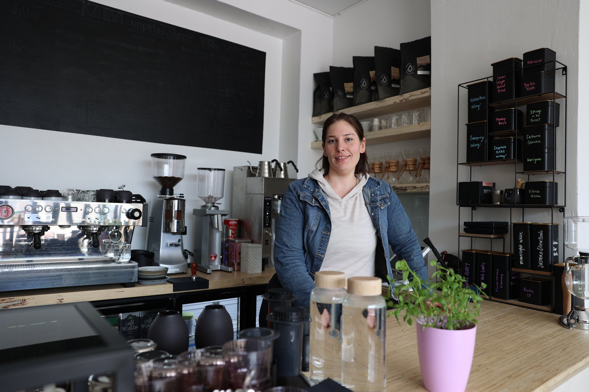 A woman in Cafe Monk, Joensuu. Start a business with Business Joensuu.