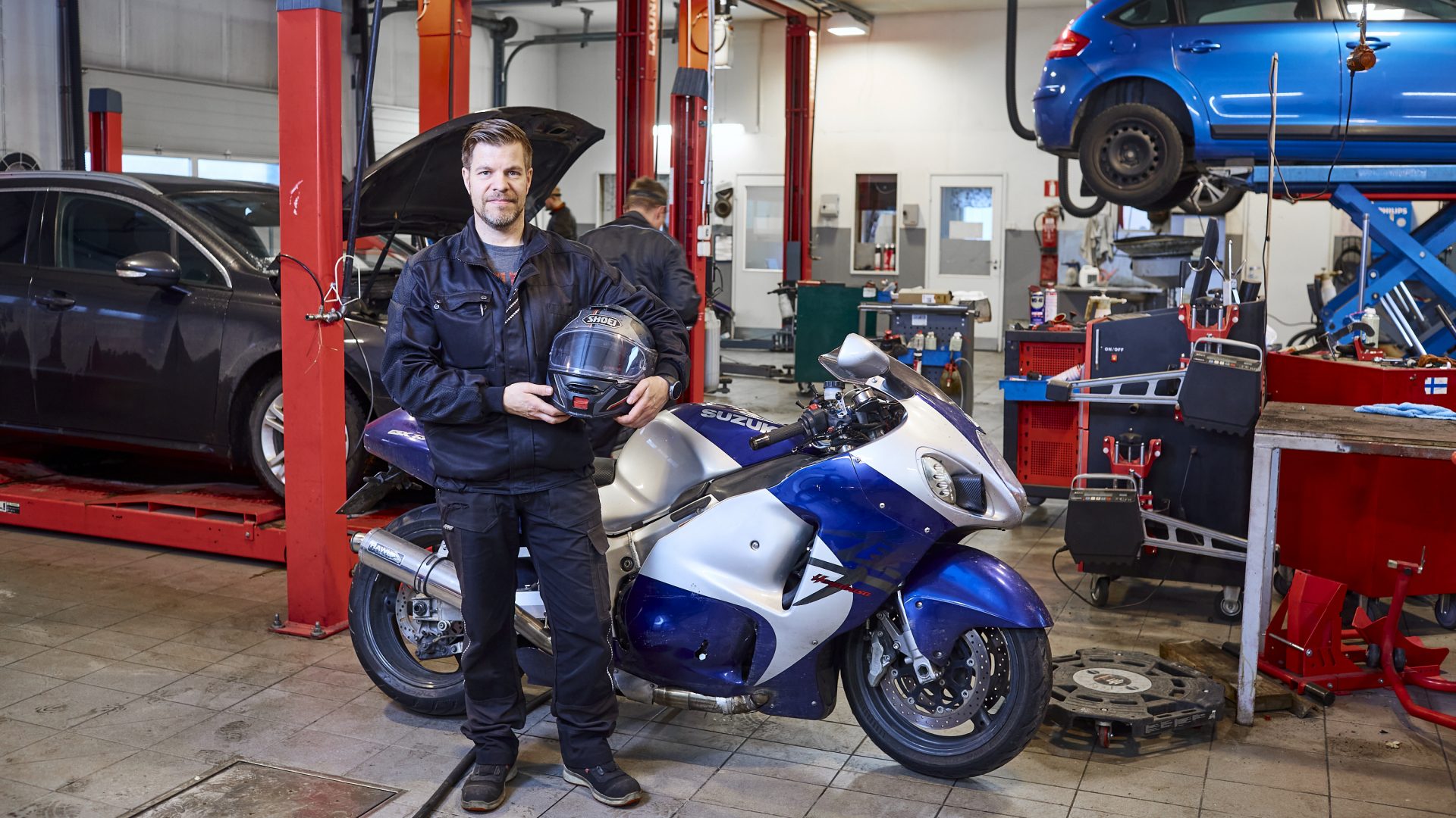 Auto France's CEO Jarno Valkonen in their garage